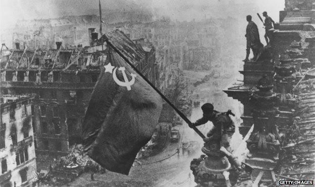 A Soviet flag raised above the Reichstag in Berlin