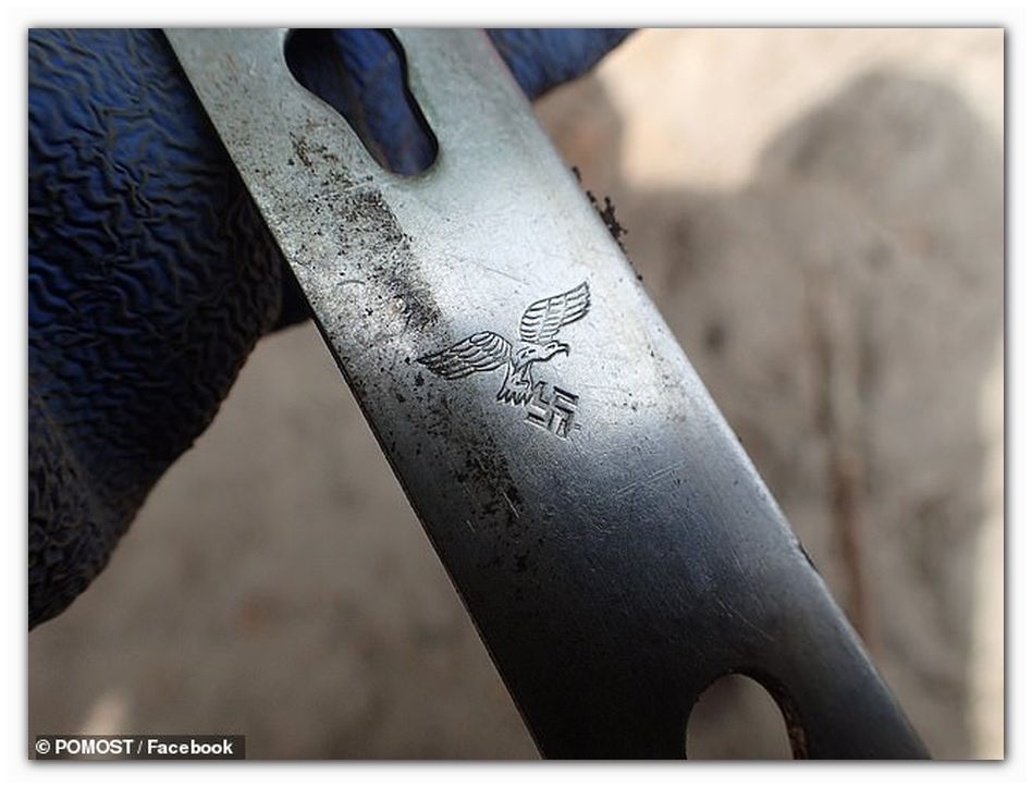 The skeletons were laid side-by-side on the pit, along with a number of items including a steel tool with the Luftwaffe symbol that shows an eagle hovering over a swastika